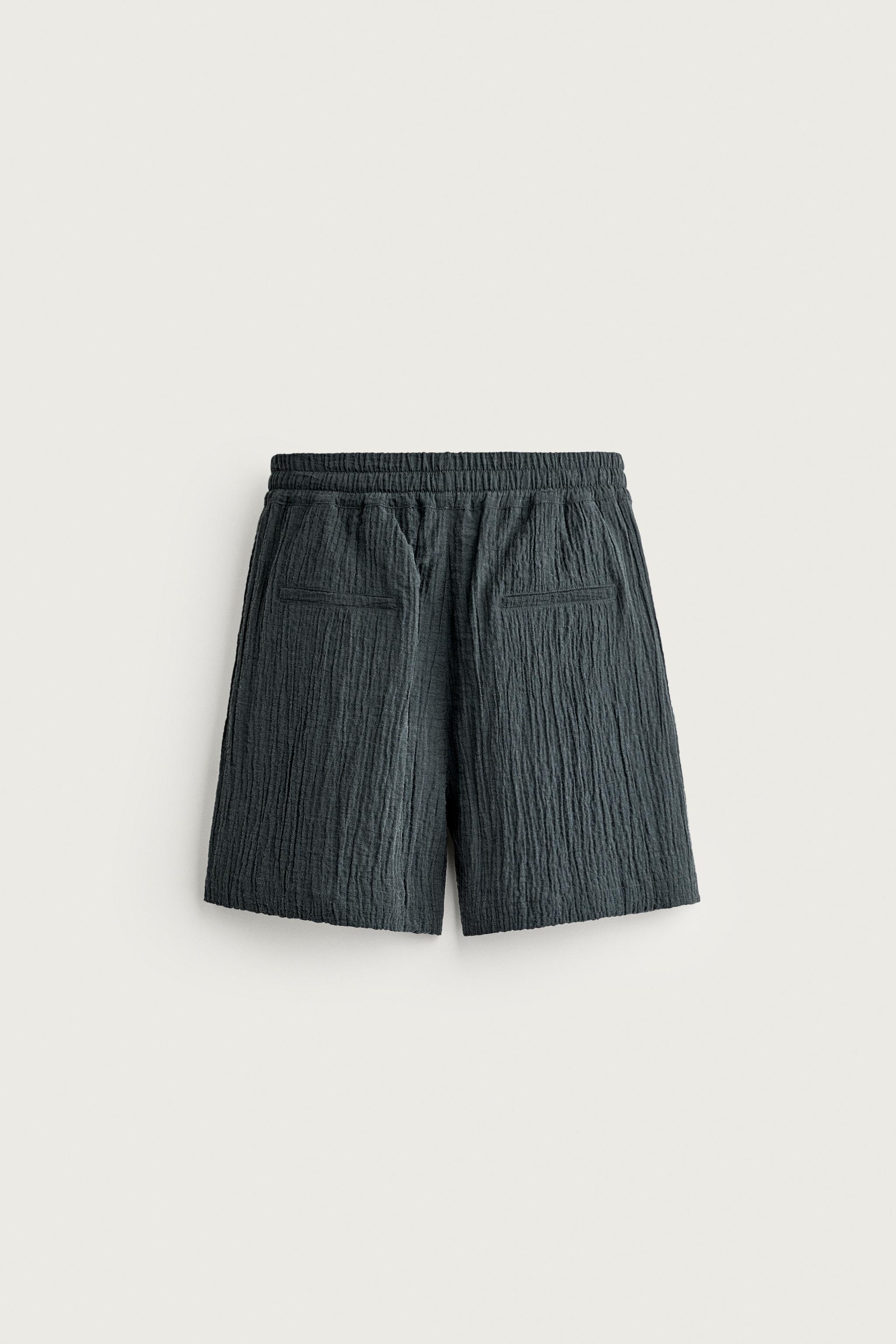 TEXTURED RELAXED FIT BERMUDA SHORTS
