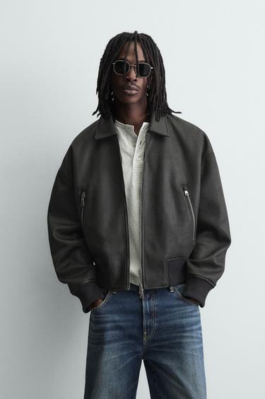 CAZADORA BOMBER EFECTO PIEL - Negro de Zara