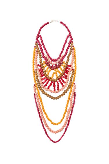 Waterfall necklace with pink, red, orange, and brown beads, with a lobster clasp.