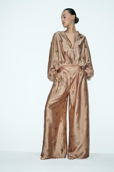 بنطلون بطيات وتطريزات أزهار - نحاس by Zara