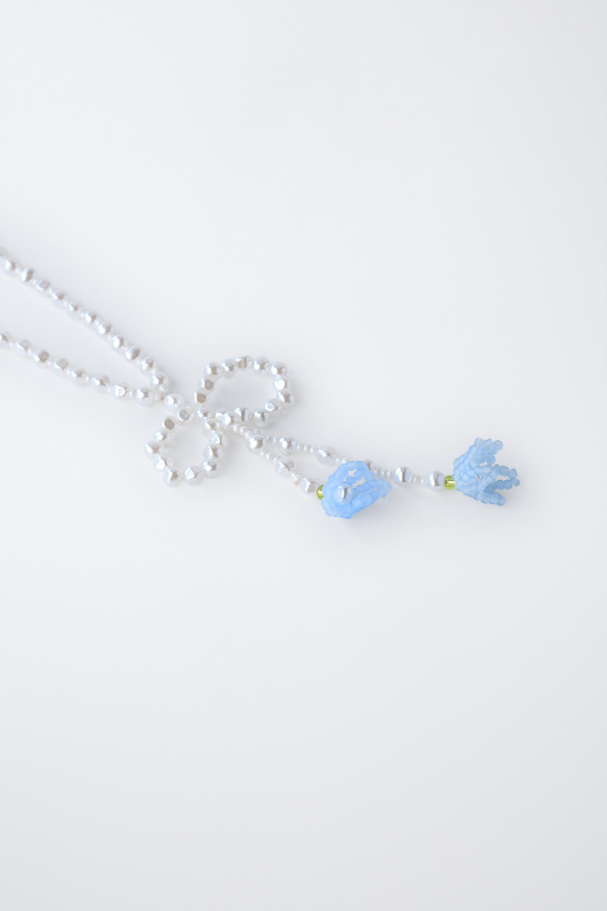 COLLIER PERLES FLEURS FANTAISIE