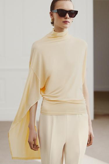 ТОП АСИММЕТРИЧНОГО КРОЯ ИЗ СТРУЯЩЕЙСЯ ТКАНИ — ЦВЕТ СЛИВОЧНОГО МАСЛА от Zara