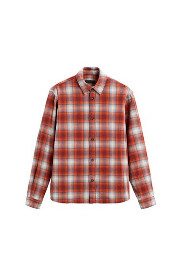 Front view of a button-down plaid shirt in shades of orange and blue.