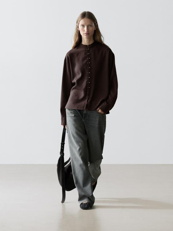 Flowing shirt with button details