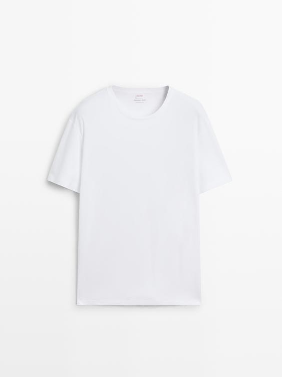 Short sleeve pyjama top and striped trousers