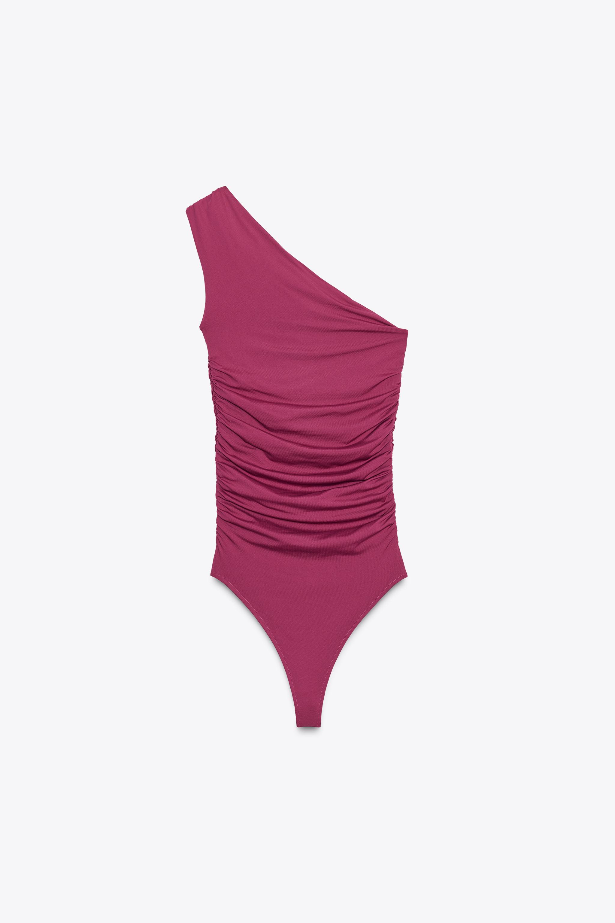 ASYMMETRIC POLYAMIDE BODYSUIT WITH METAL DETAIL