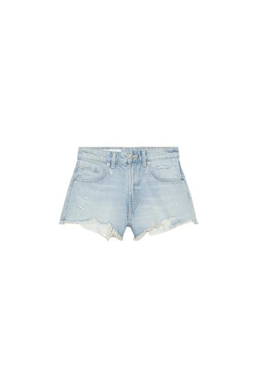 Front view of light blue, distressed Bermuda shorts, with front and back pockets, a high waist, and frayed hems.