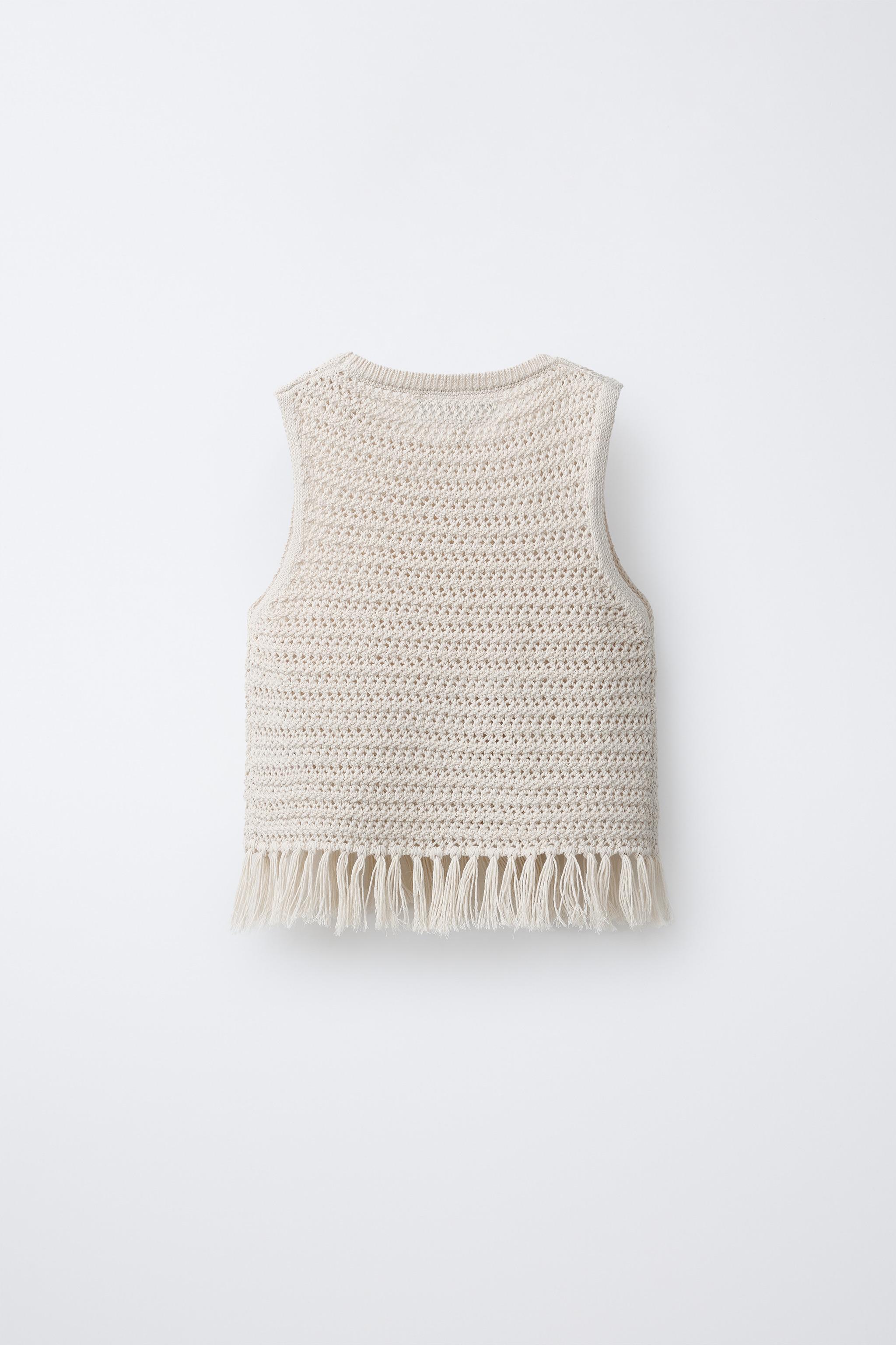 TOP EN MAILLE À FRANGES