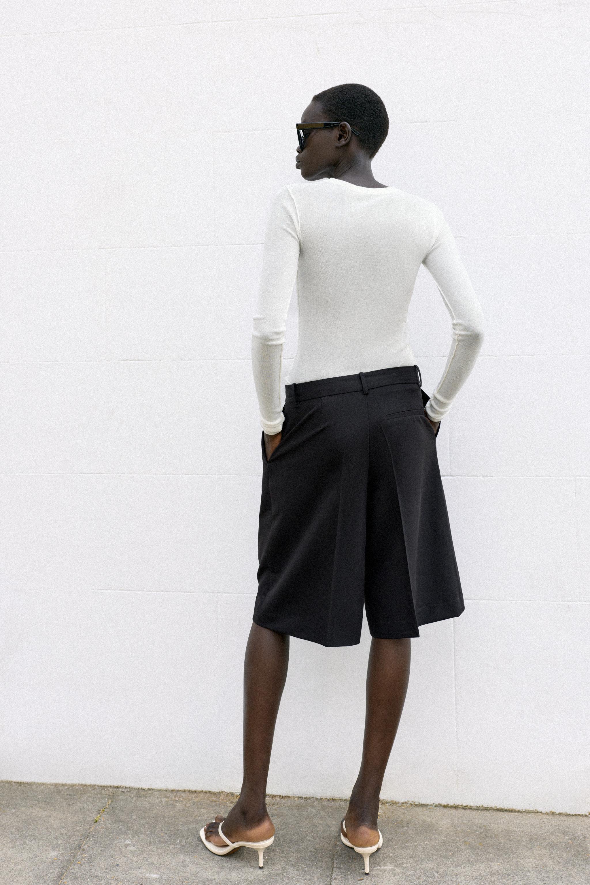 LONG PLEATED BERMUDA SHORTS