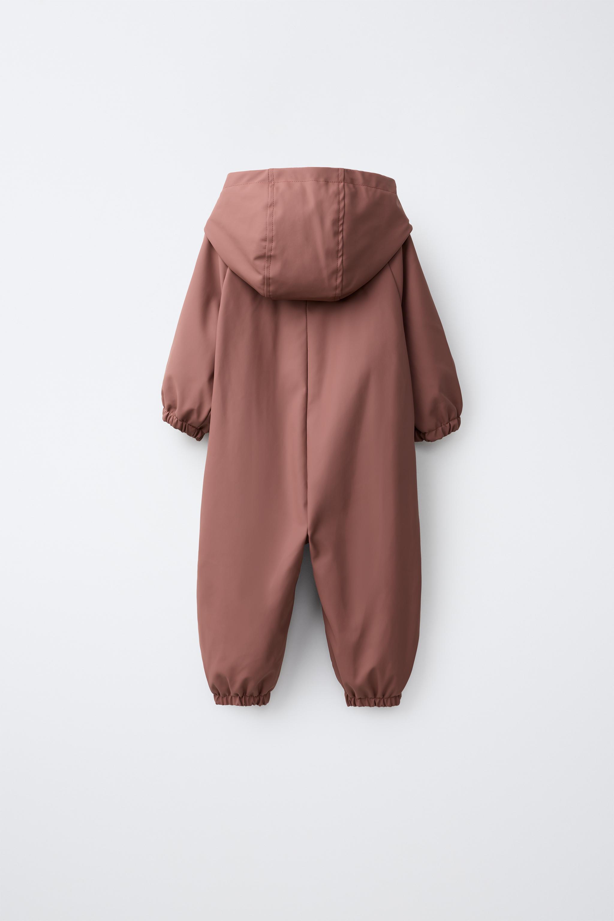 WATER-RESISTANT FLORAL RUBBERIZED JUMPSUIT — Plum