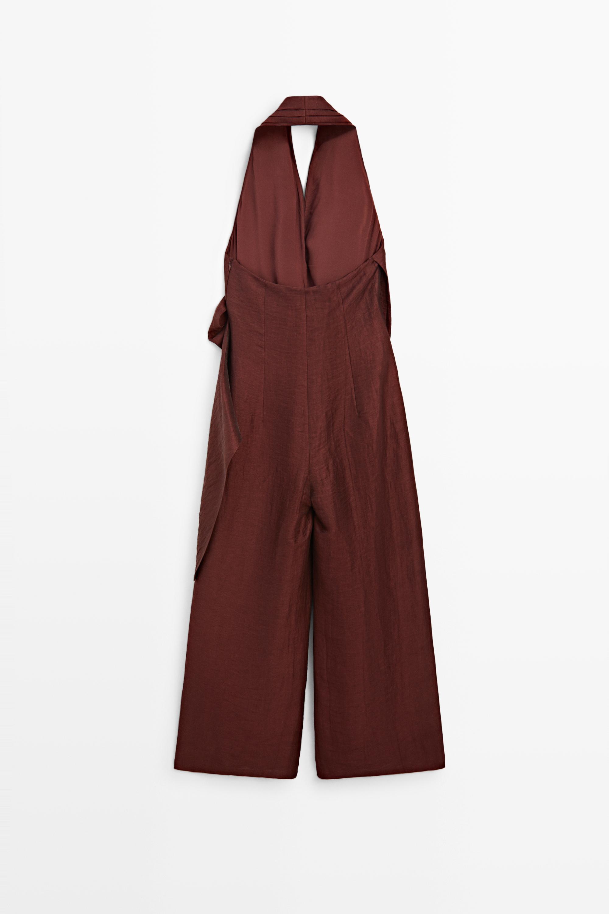 Flowing draped halter neck jumpsuit