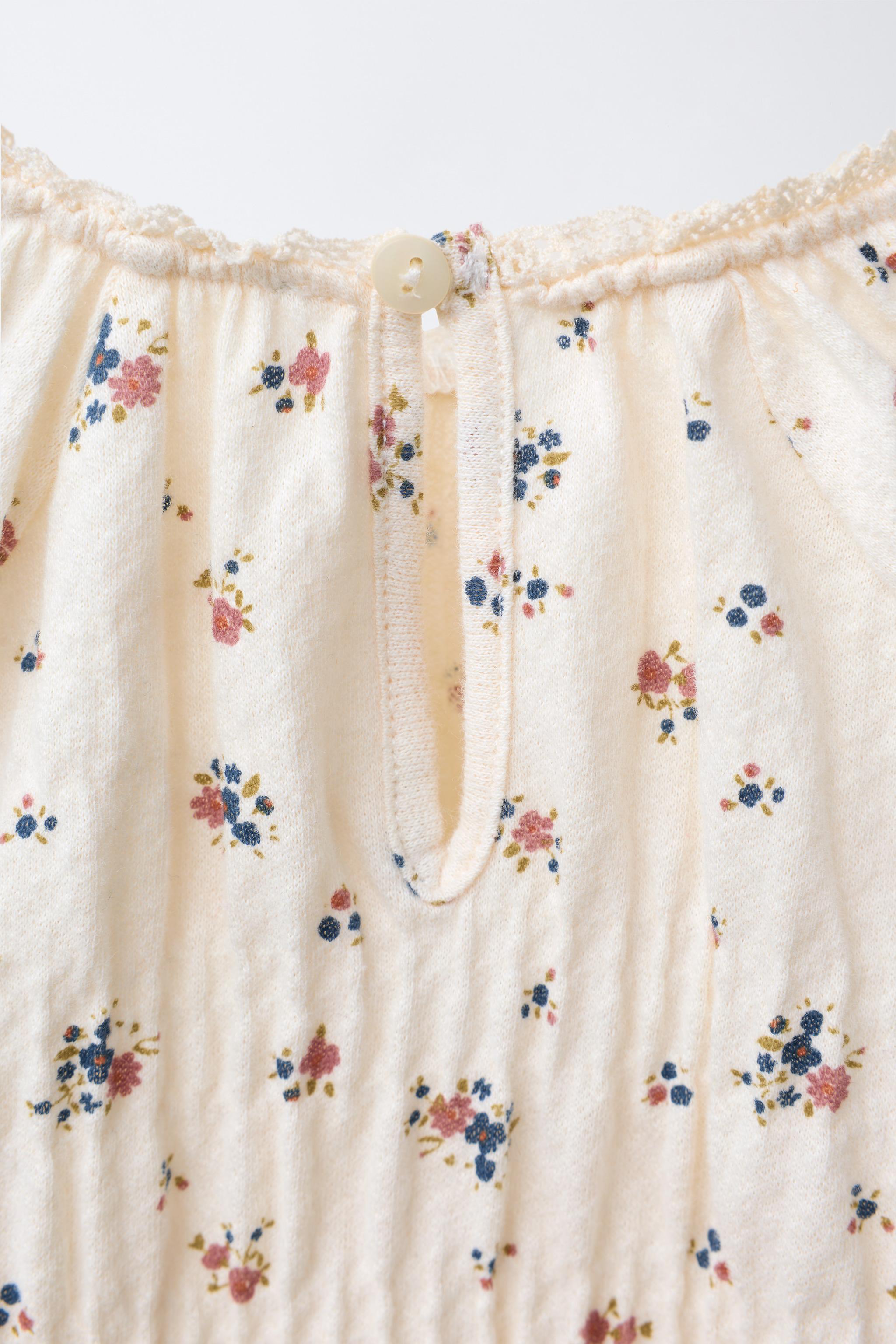 BODY À FLEURS AVEC DENTELLE RAPPORTÉE