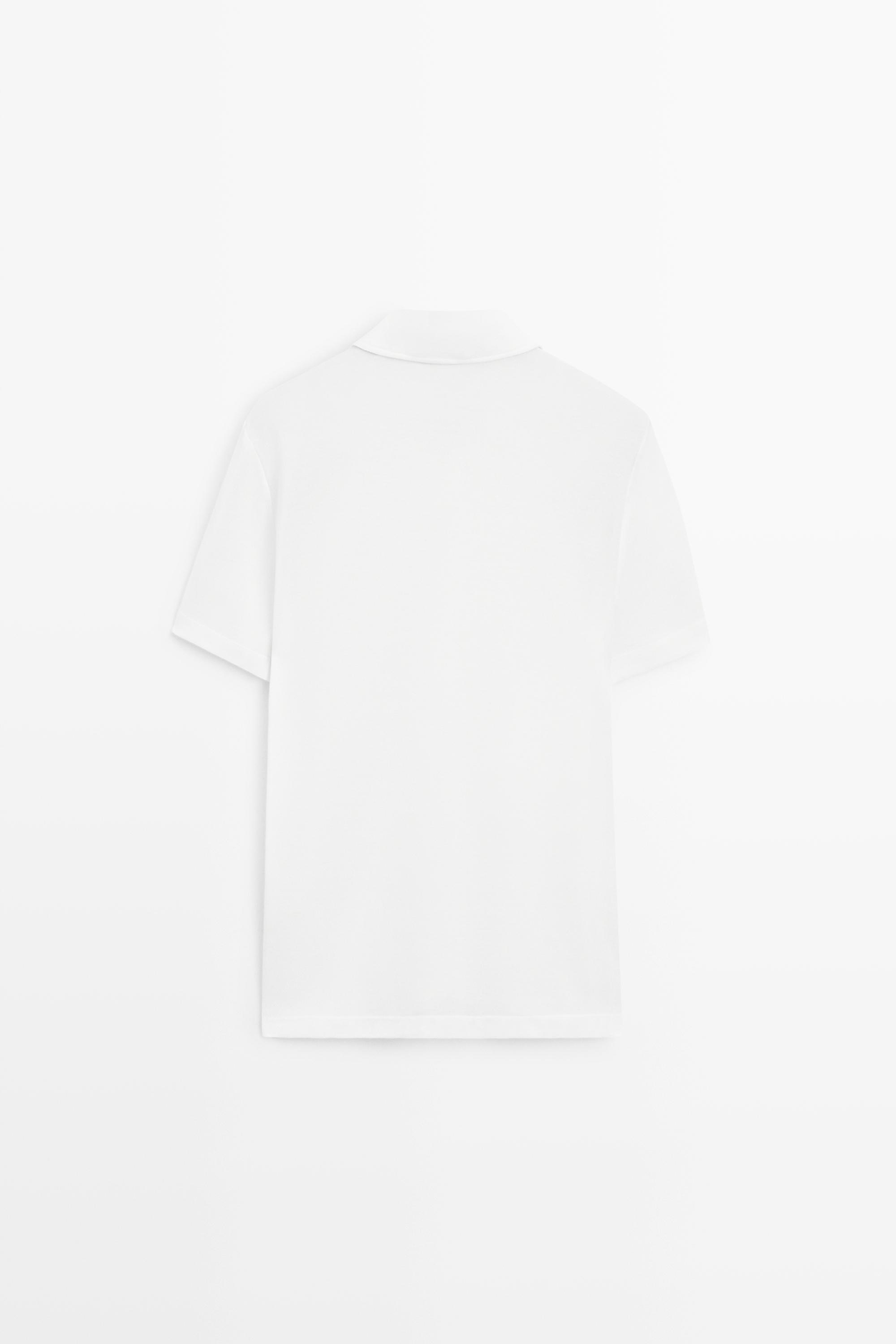 Polo piqué micro-texturé à col en V