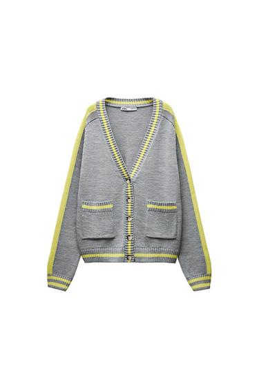 Front view of a grey cardigan with yellow stripes, front button fastening, and side pockets.