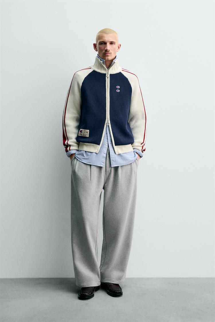 COLOR-BLOCK-STRICKJACKE MIT STREIFEN CHAMPION® X ZARA Marineblau