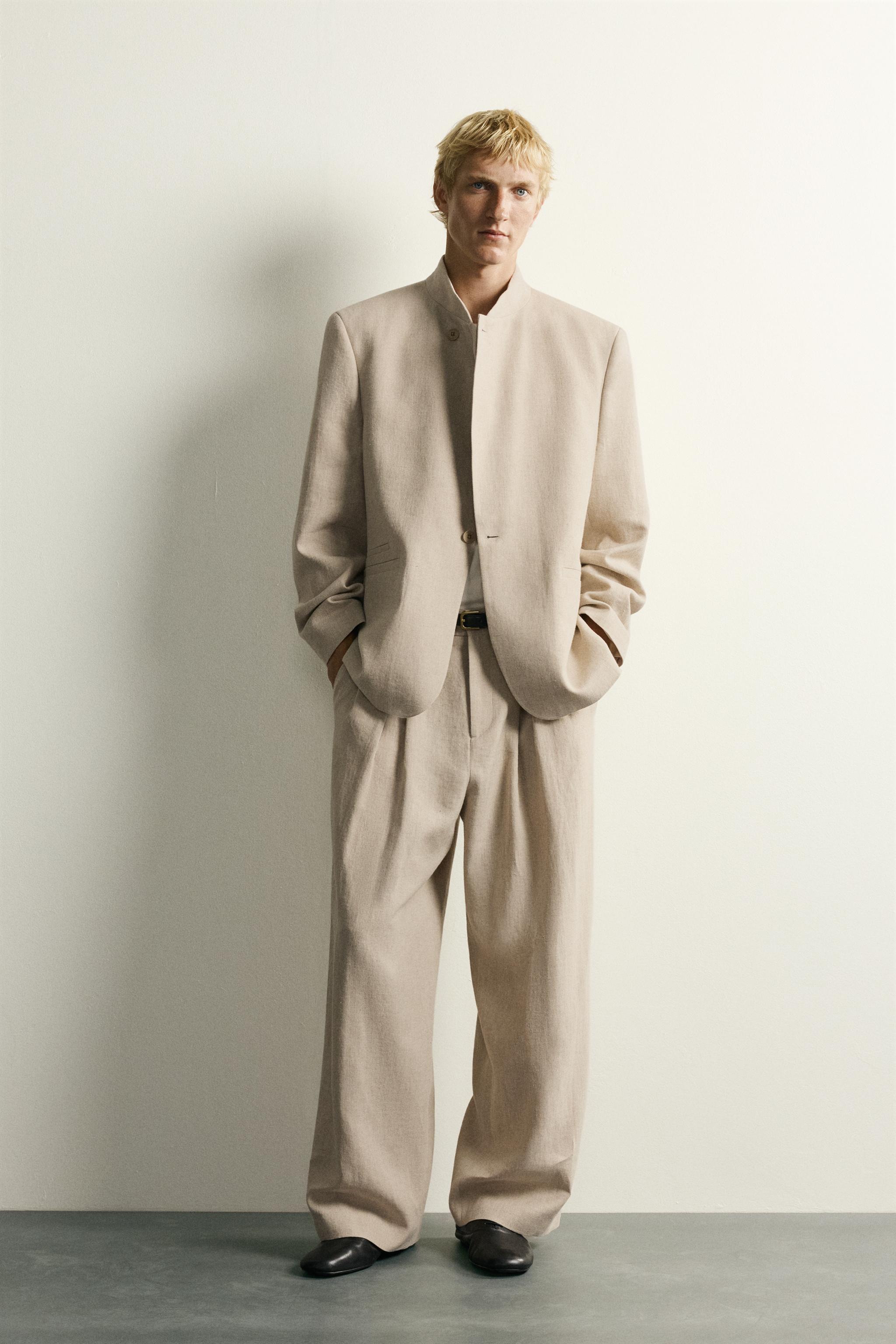 RELAXED FIT PLEATED SUIT PANTS