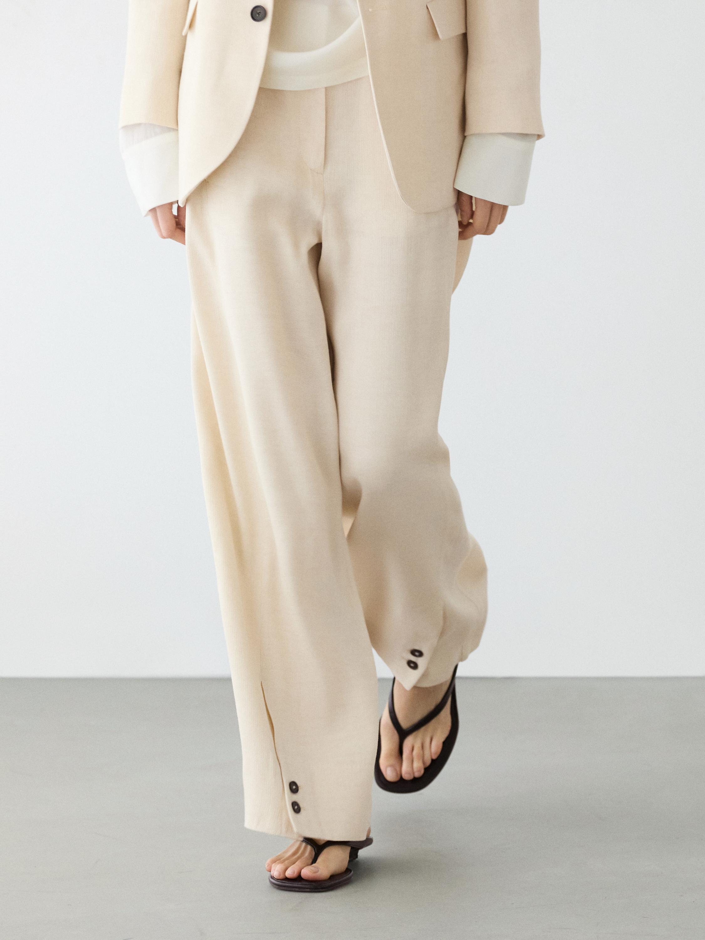 Linen blend suit trousers with button detail — Ecru