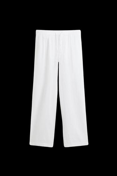 PANTALÓN EFECTO ARRUGADO - Blanco de Zara - Imagen 0