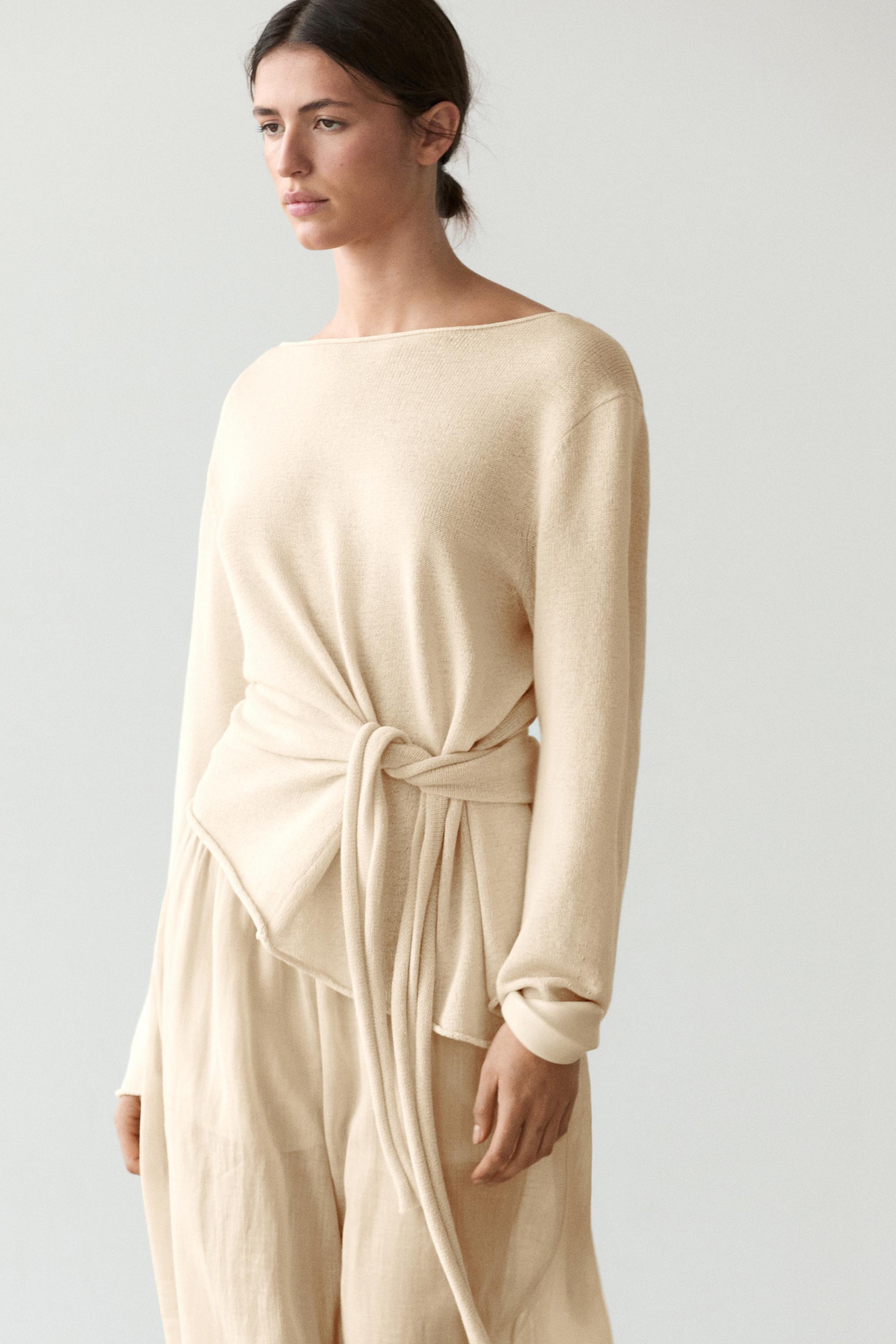 Asymmetric linen blend sweater with tie detail