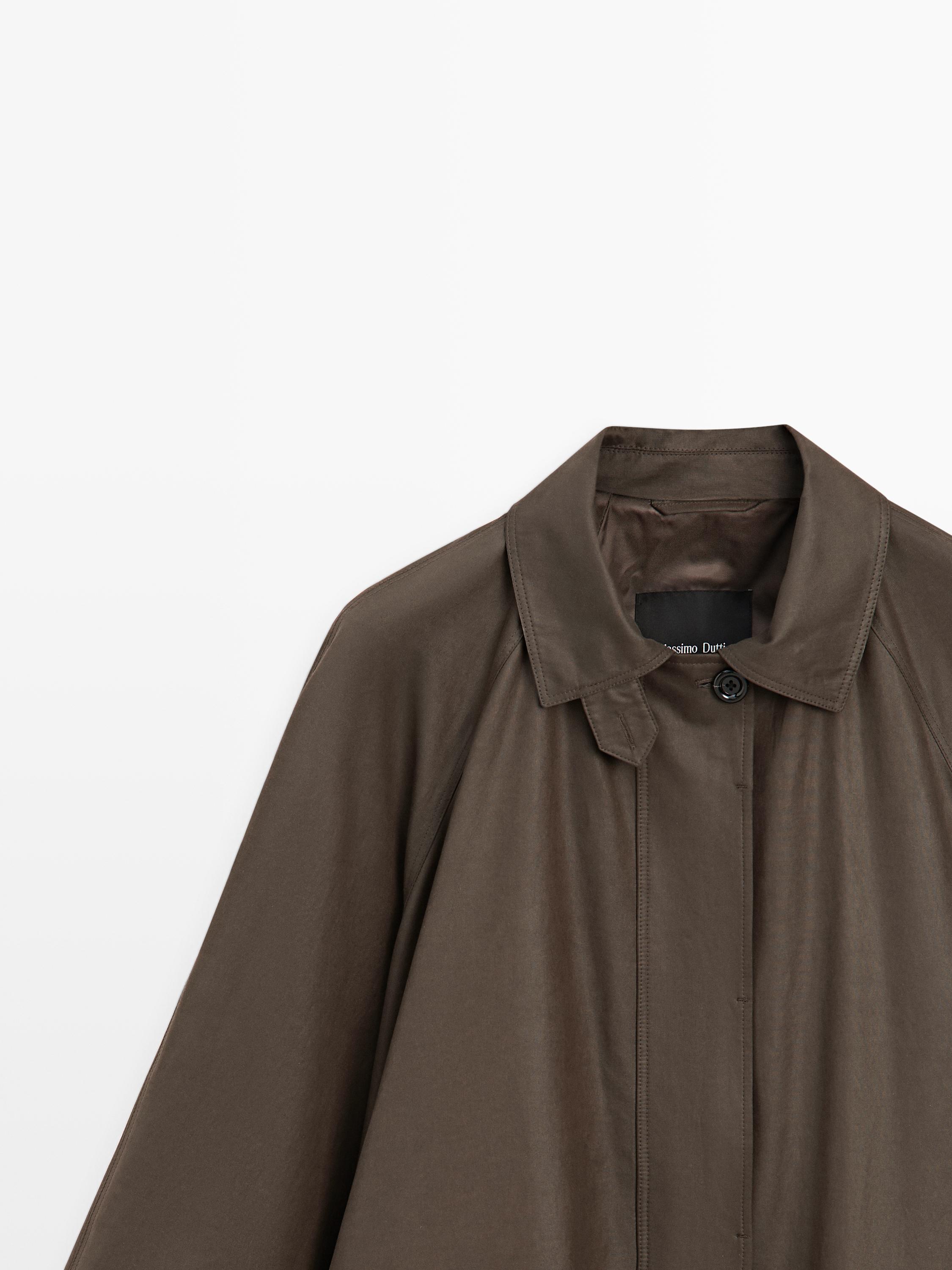 Parka longue détail poches