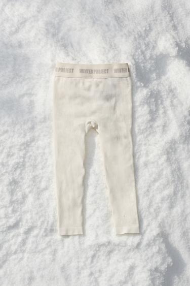 Zara EMBOSSED TEXT RIBBED LEGGINGS - Ecru