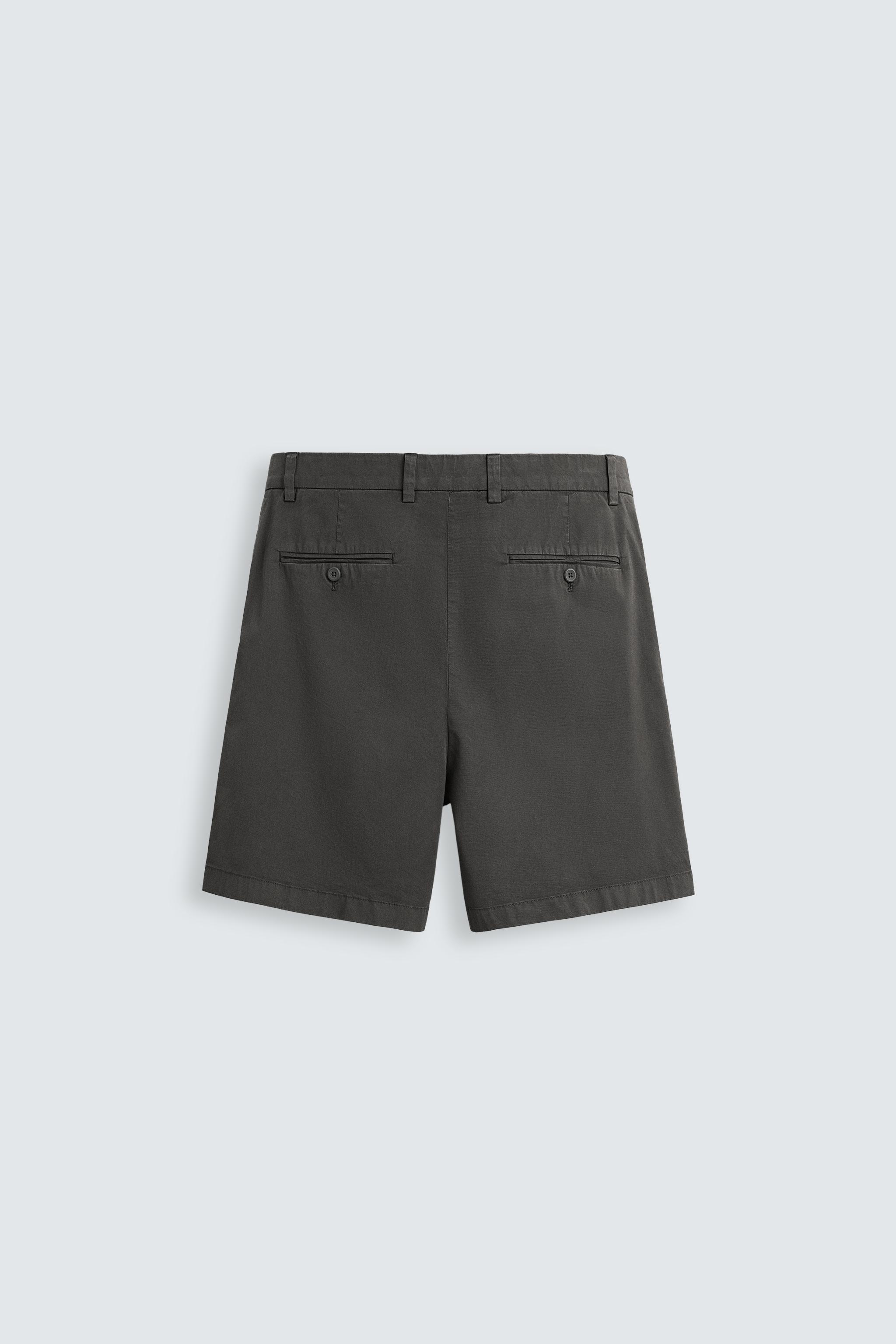 REGULAR FIT PLEATED BERMUDA SHORTS