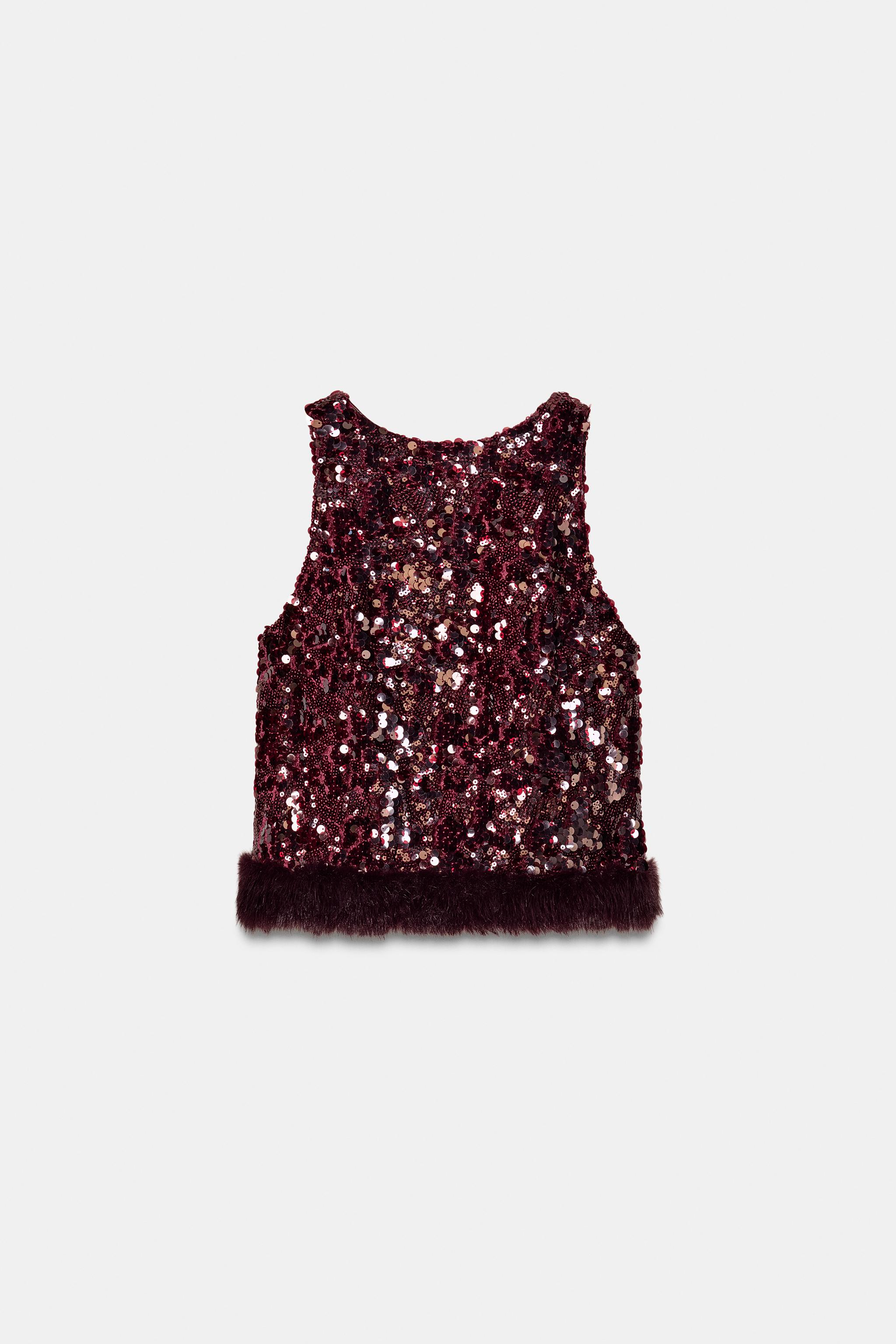 SEQUIN TOP WITH FAUX FUR HEM