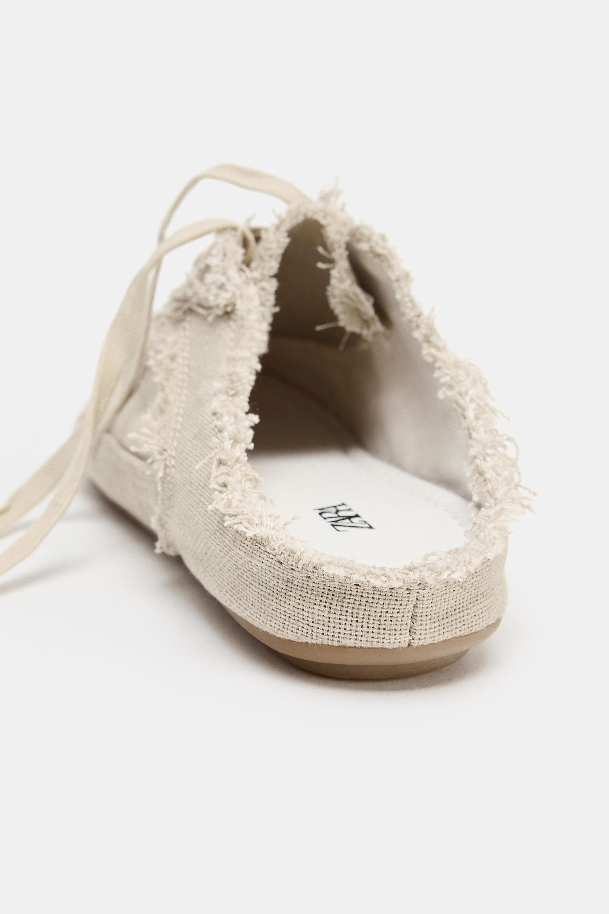 WORN-EFFECT MULE SNEAKERS