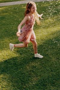 SHORT RUFFLED FLORAL JUMPSUIT