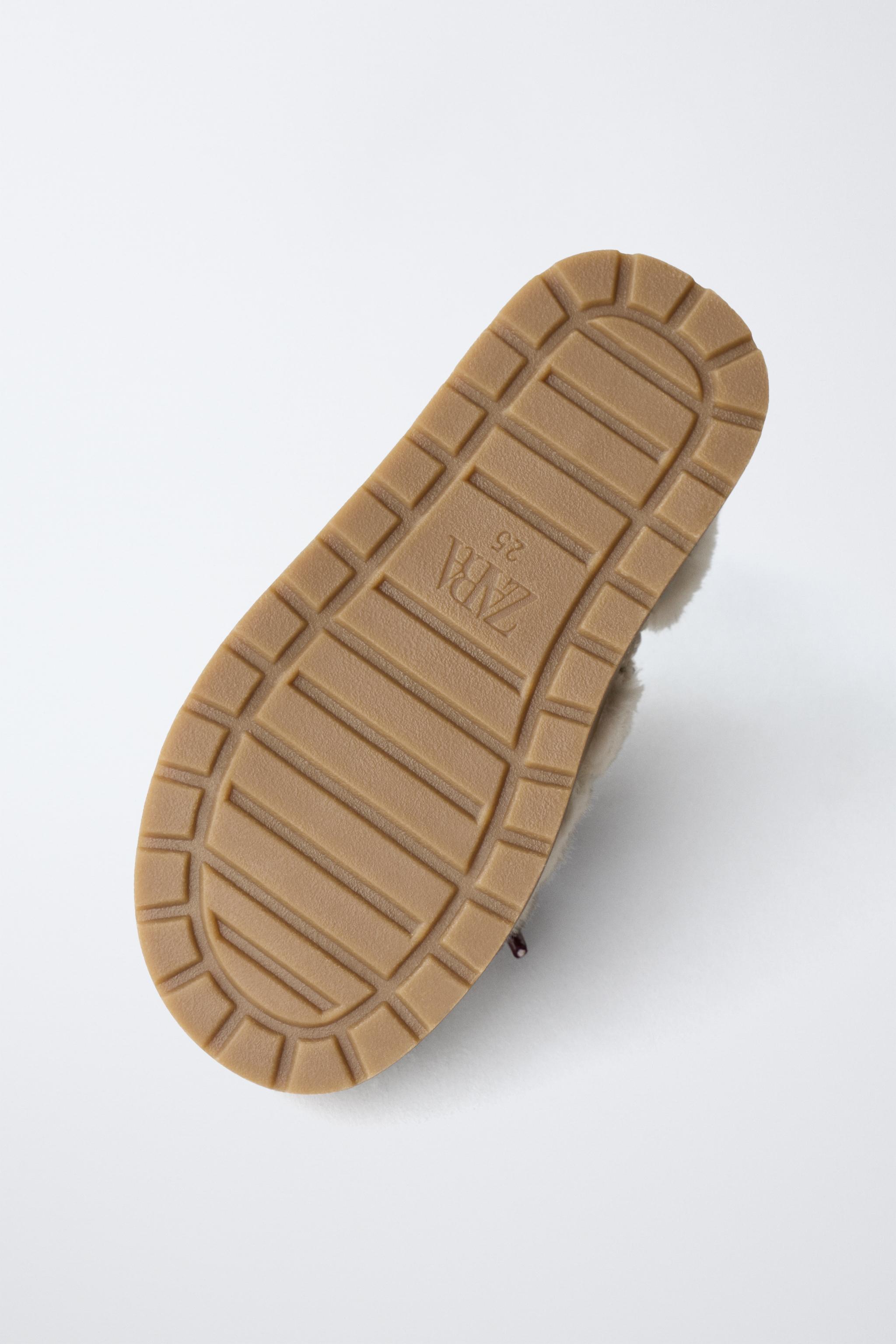 BEADED FUR-LINED BOOTS