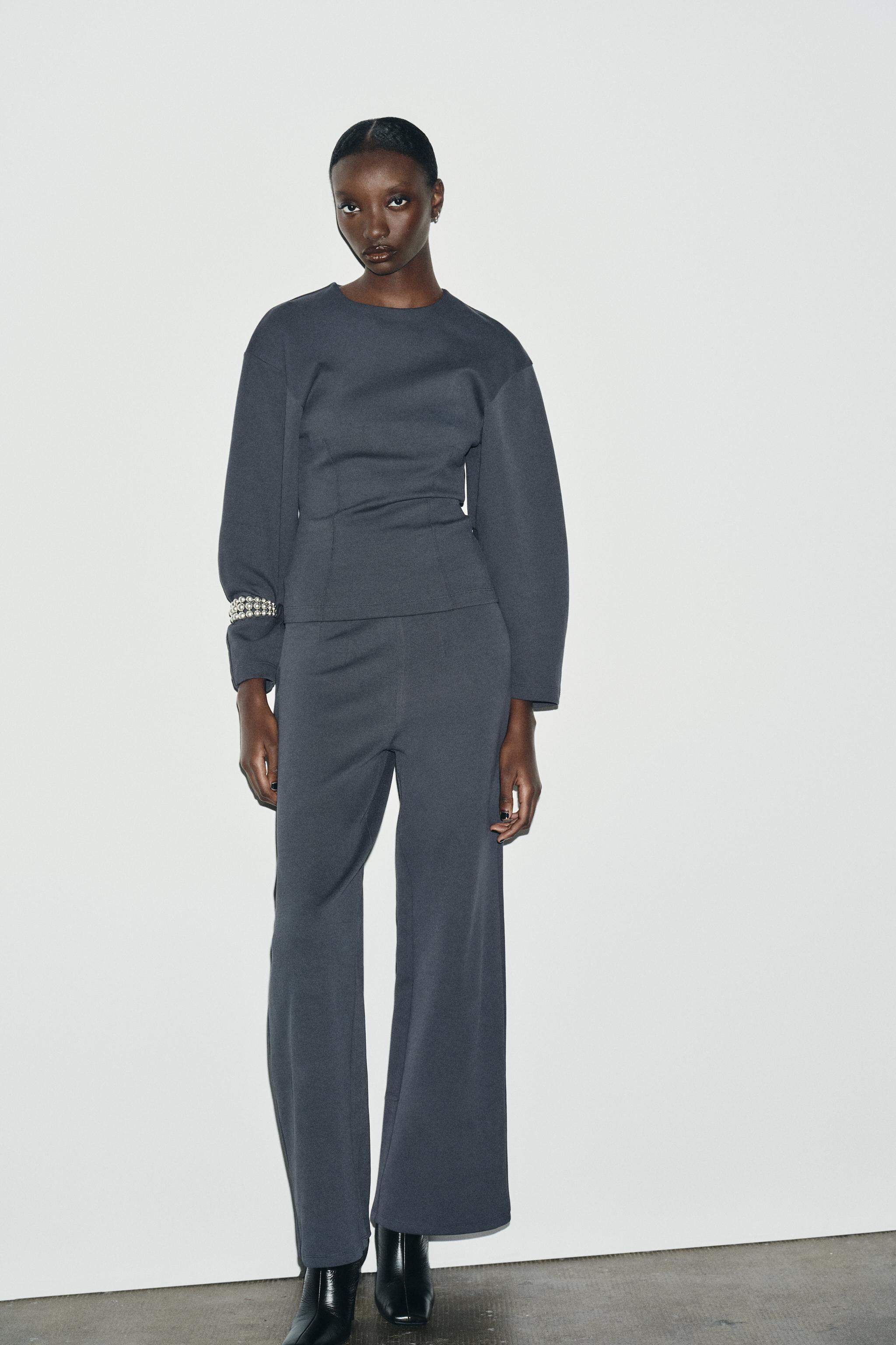 INTERLOCK JUMPER WITH DARTS