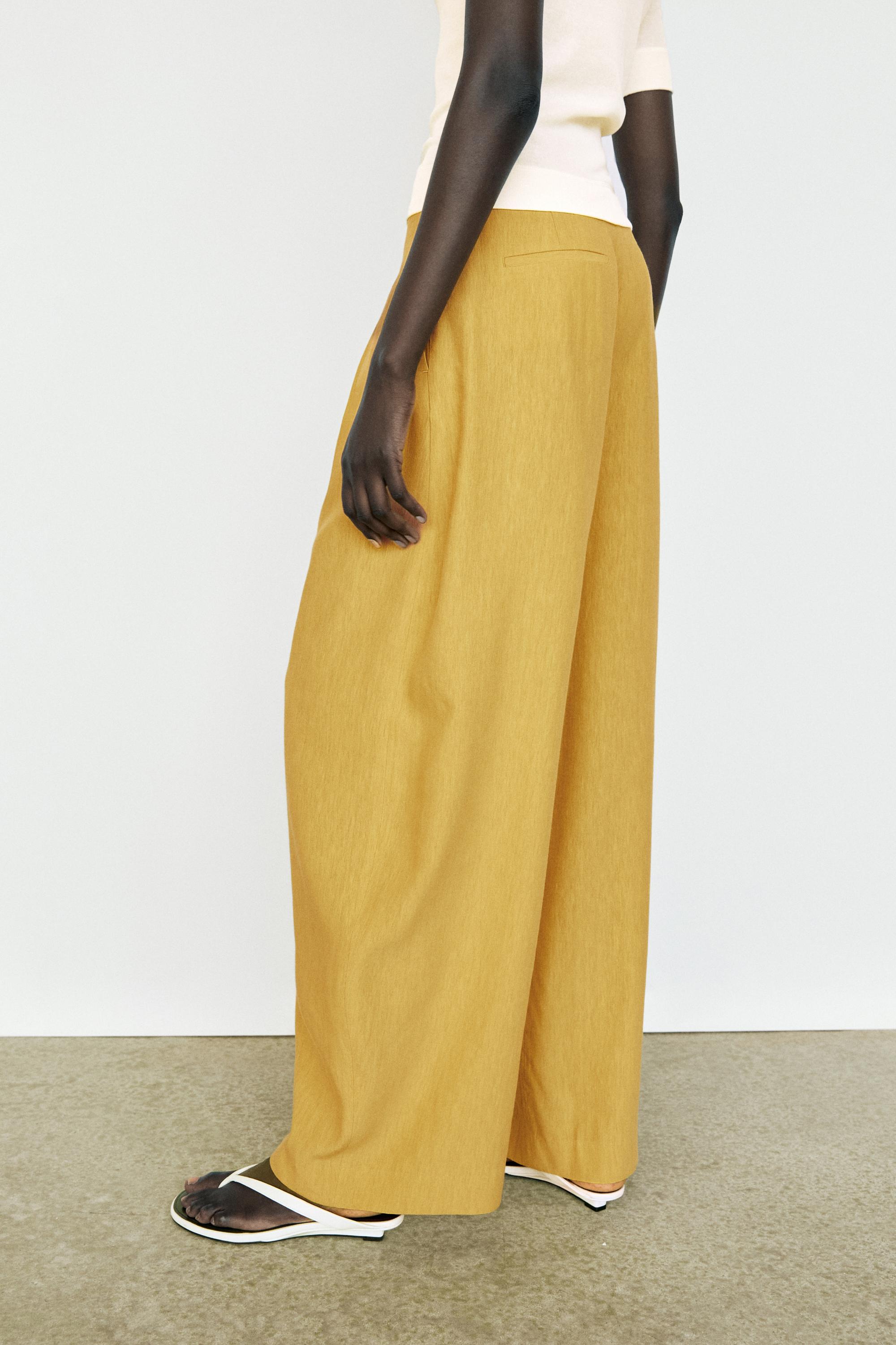 Wide-leg flowing linen blend pleated pants