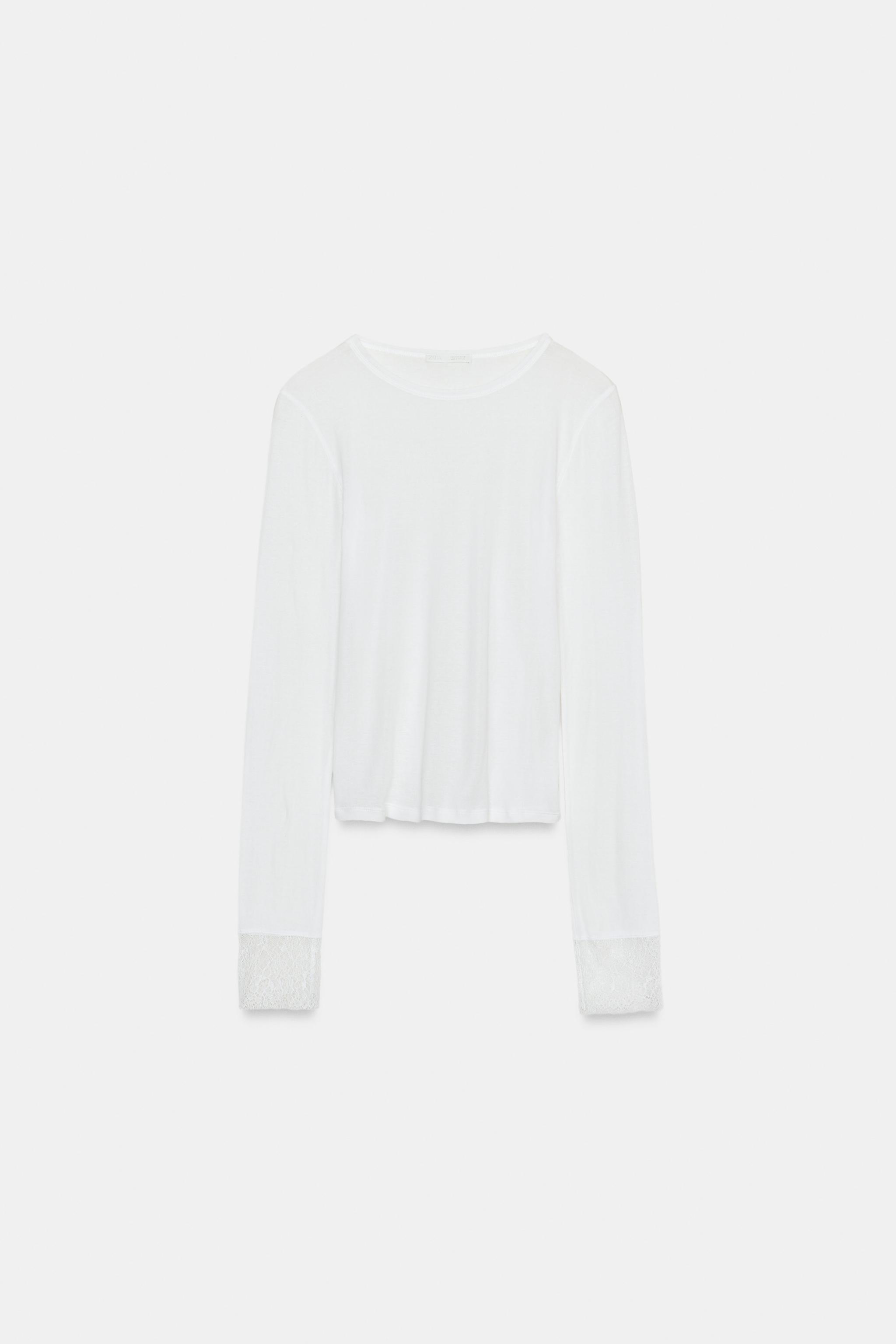 TOP SEMI-TRANSPARENT AVEC POIGNETS EN DENTELLE