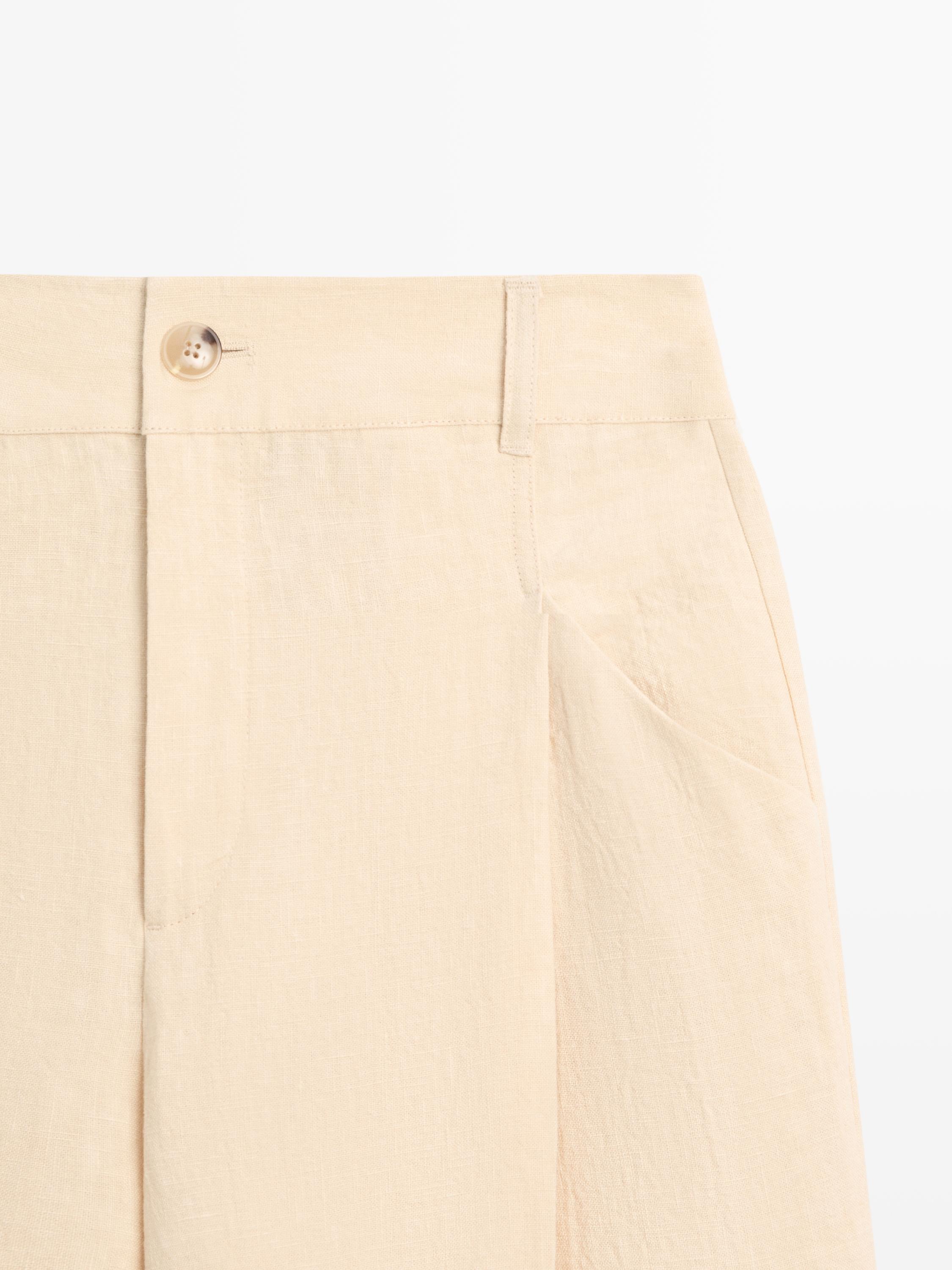 Wide-leg linen trousers with pocket detail