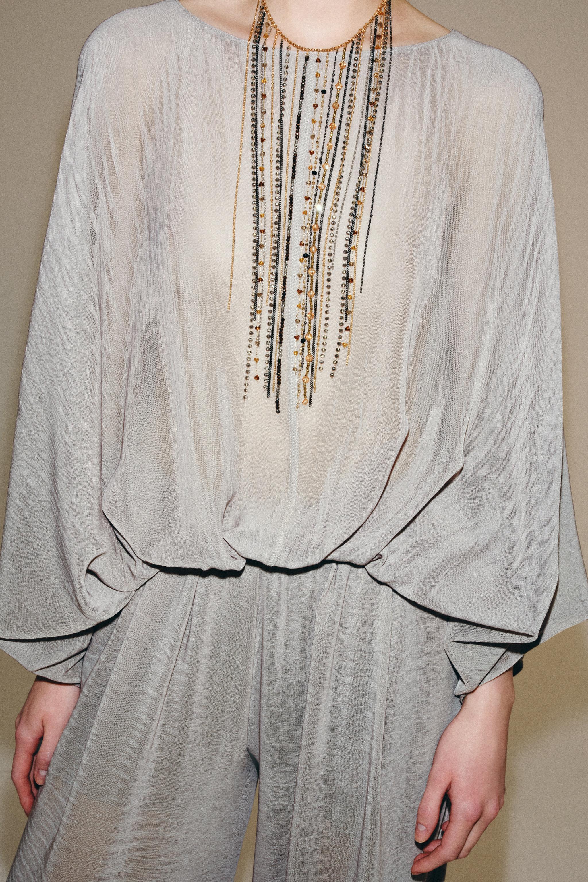 FLOWY SEMI-SHEER BODYSUIT