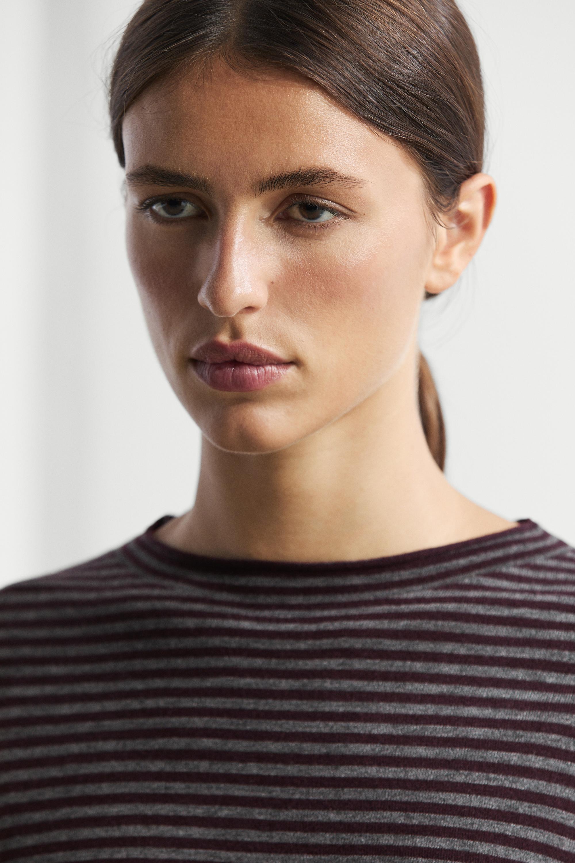 Striped knit sweater with mock turtleneck