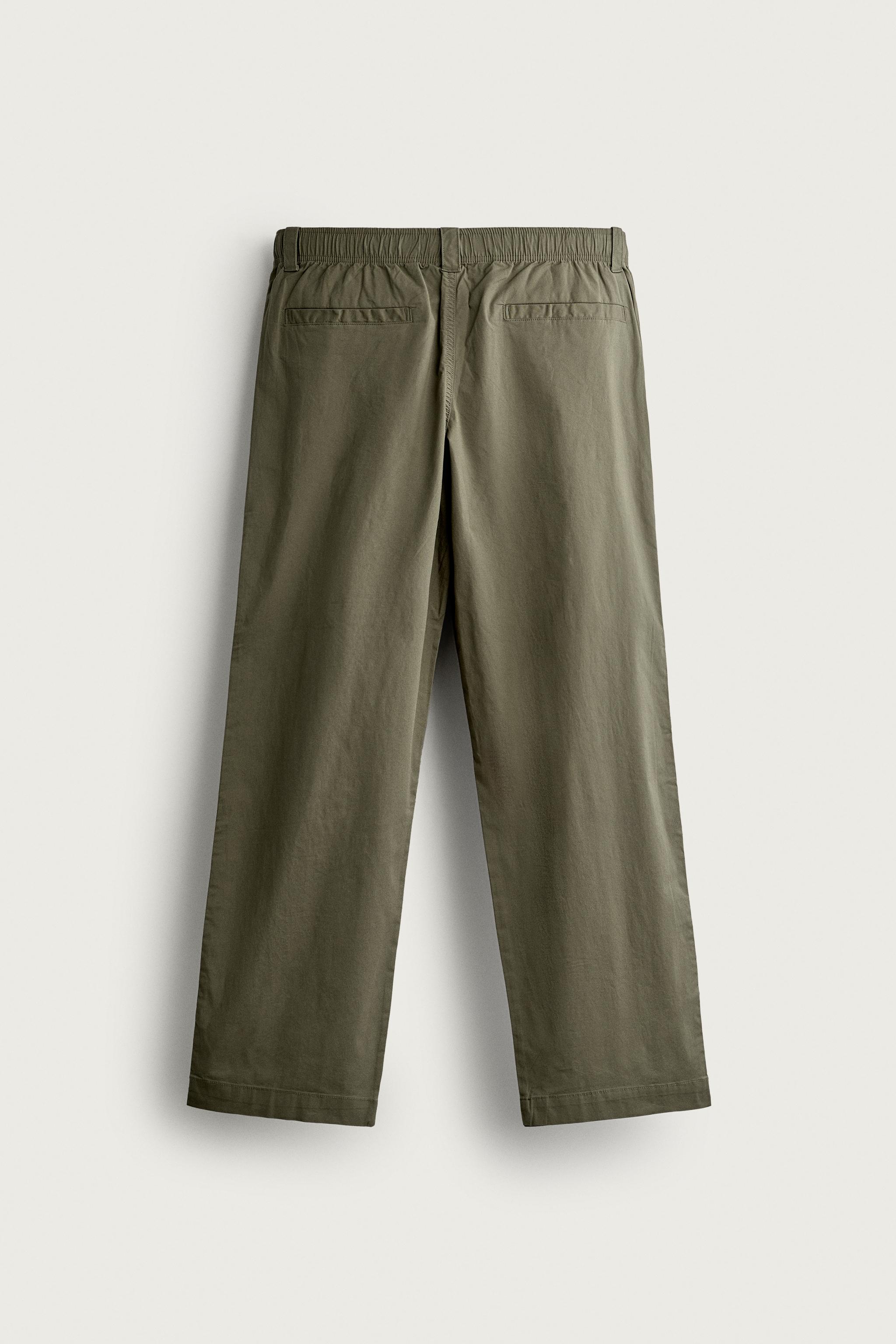 RELAXED FIT PLEATED JOGGER PANTS