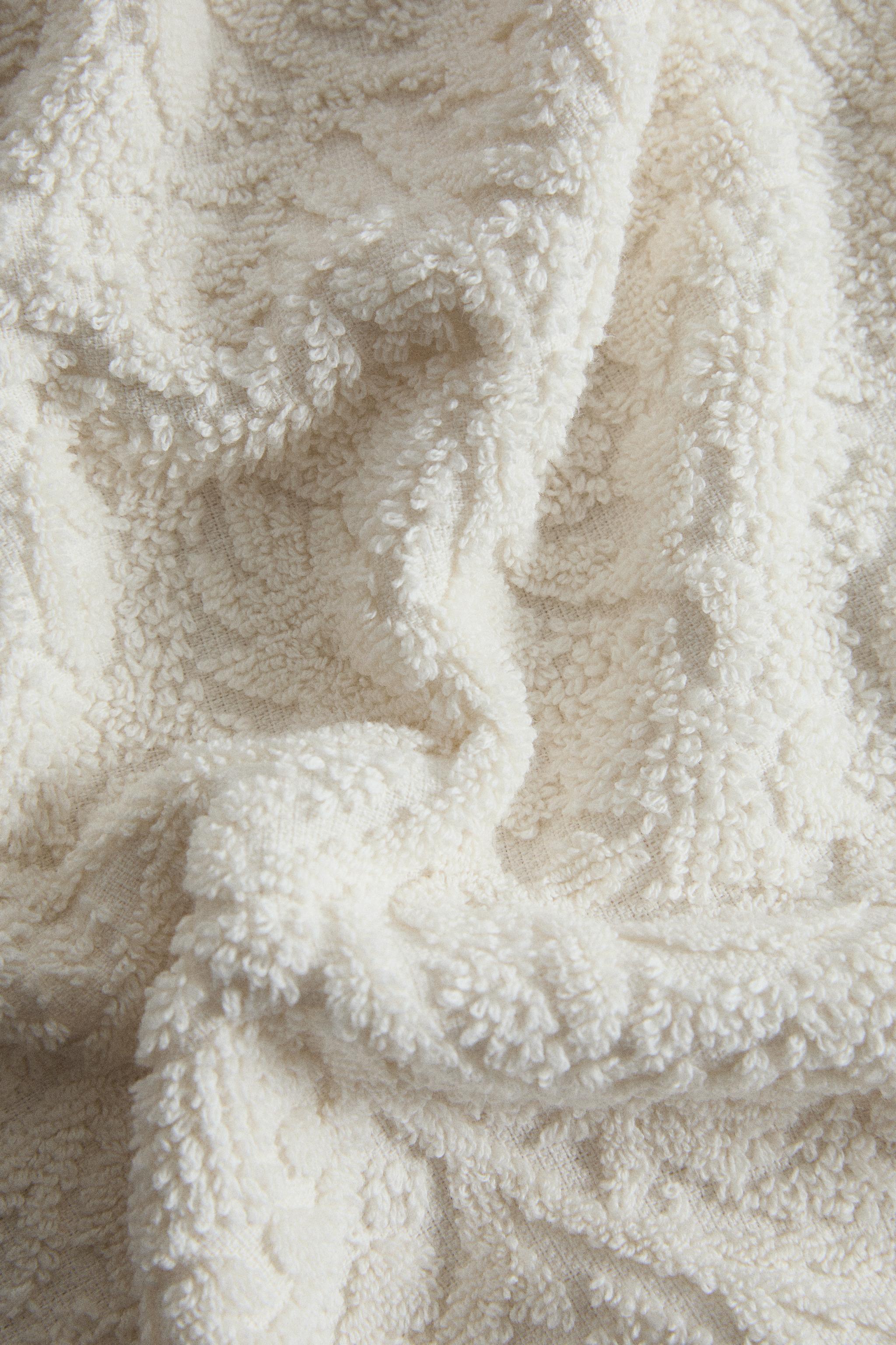 SERVIETTE DE BAIN JACQUARD FLEURS