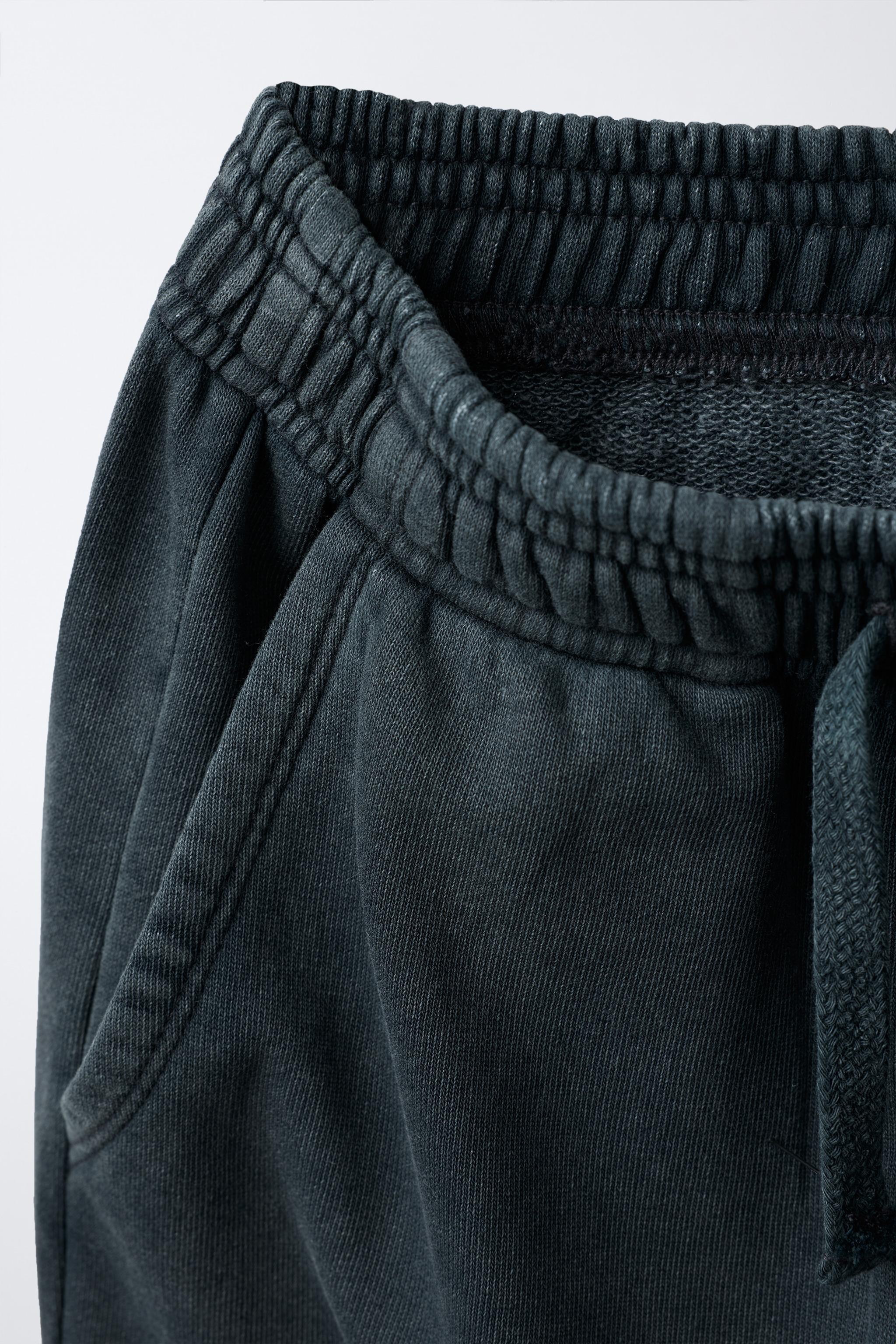 PANTALON WIDE LEG EFFET DÉLAVÉ ÉTOILES CLOUS