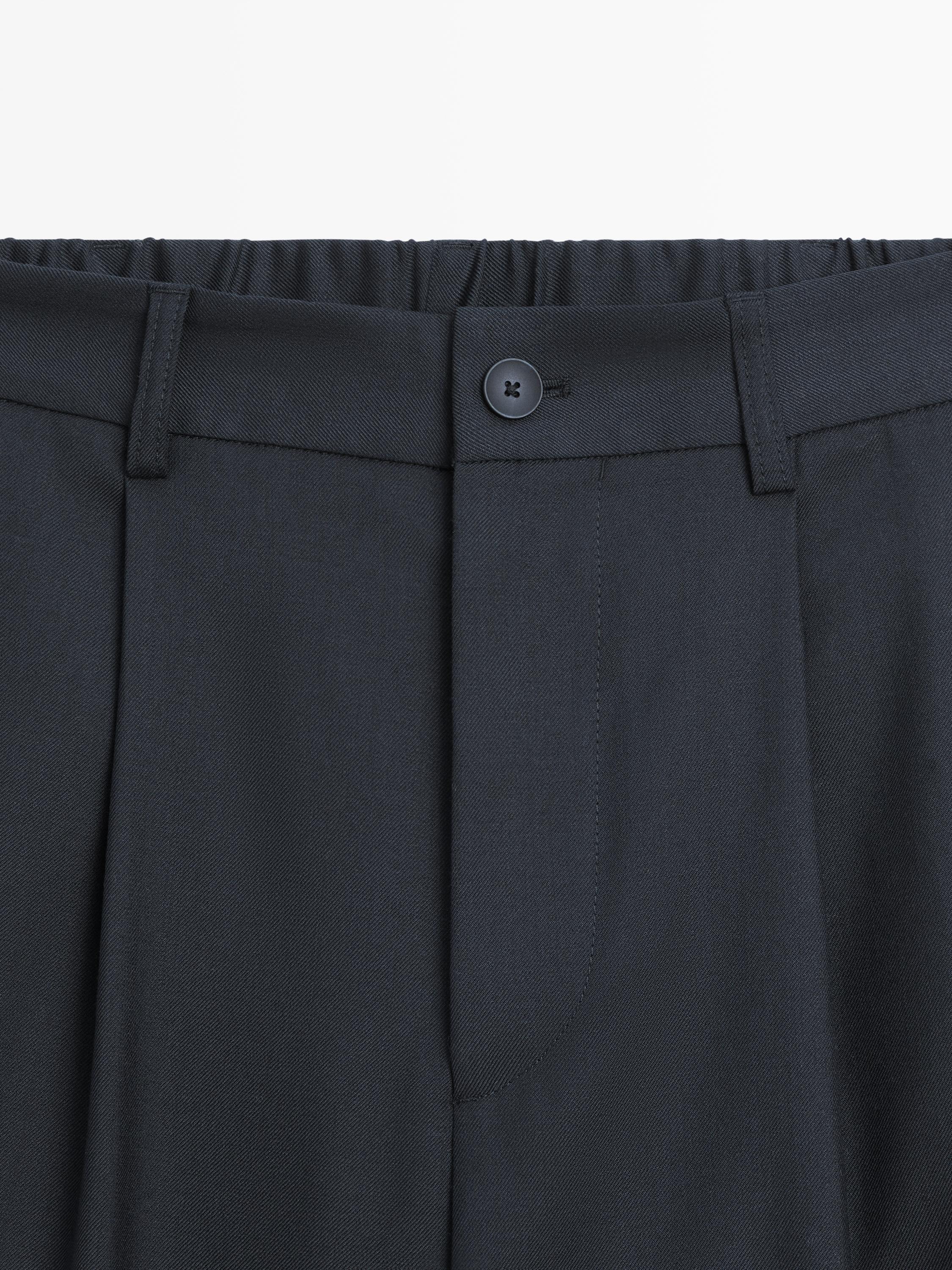 Relaxed fit wool blend trousers with darts
