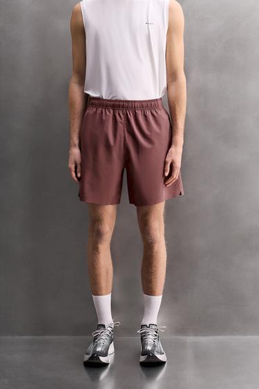 KRATKE HLAČE Z LUKNJIČASTIMI DELI - Temno rožnata od Zare