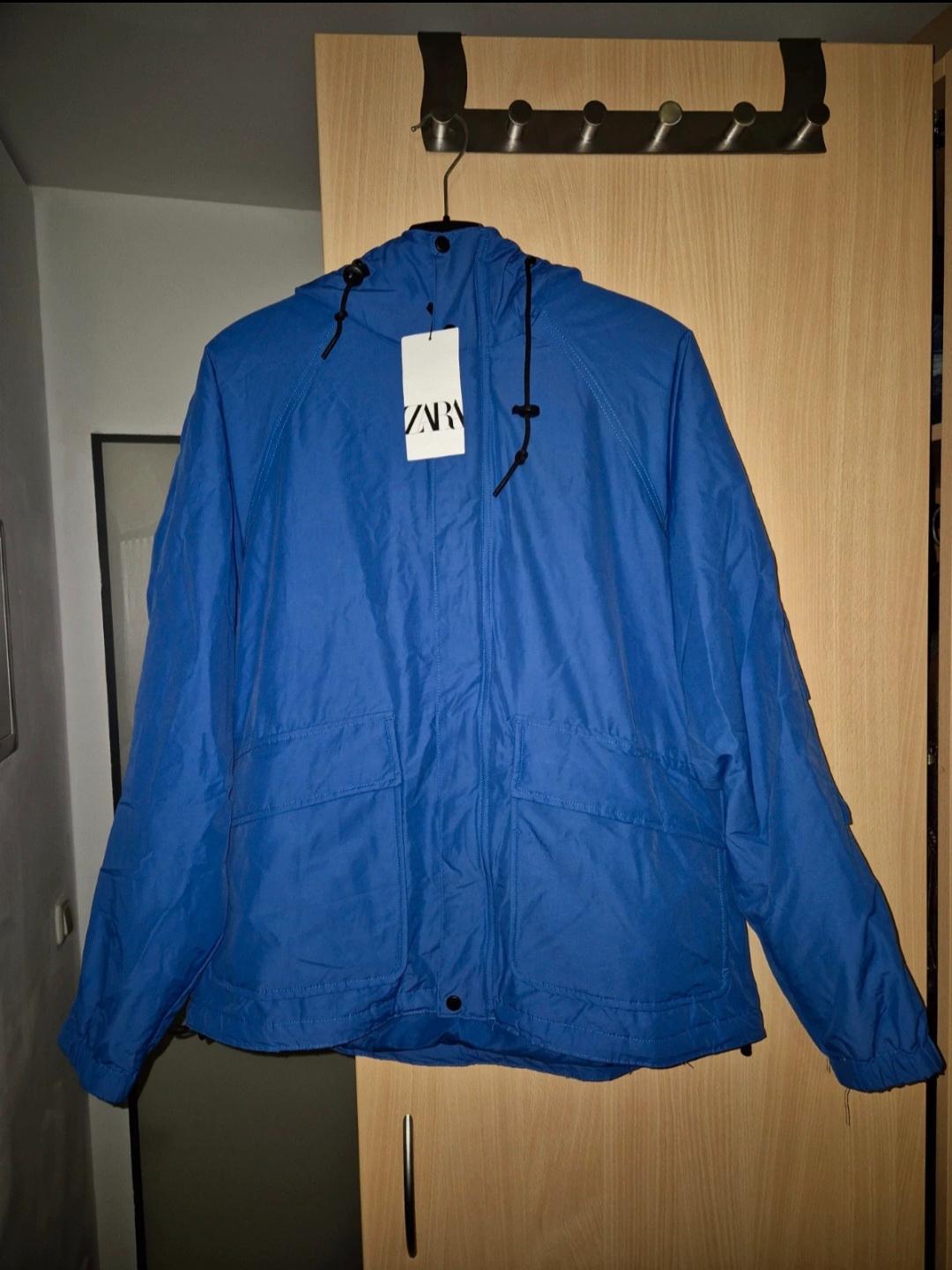 HOODED TECHNICAL JACKET