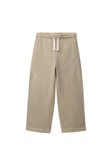 RAVNE PLIŠASTE HLAČE Z VEZENINO - Peščena od Zare