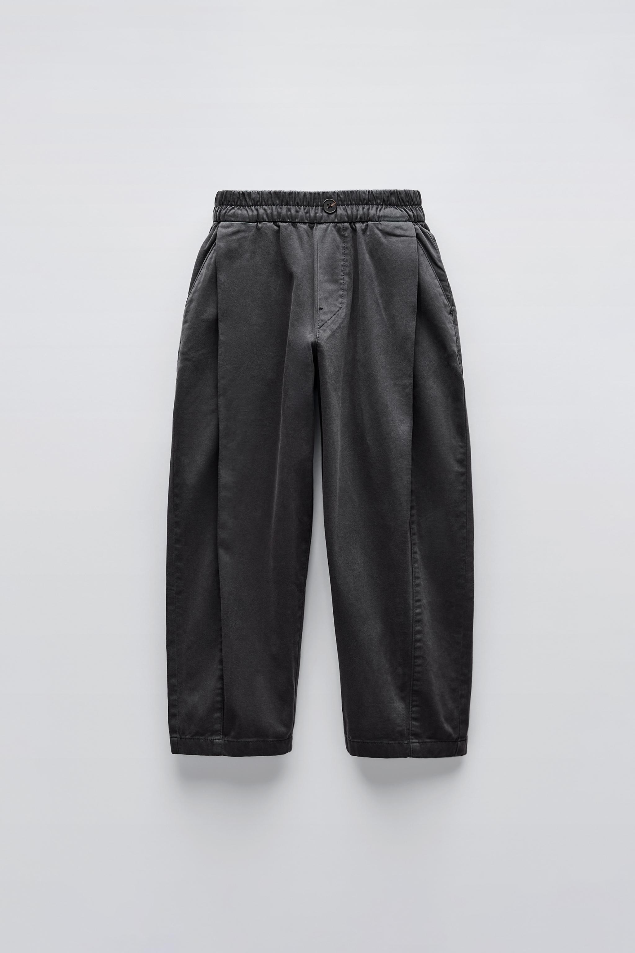 Black pleated trousers zara online