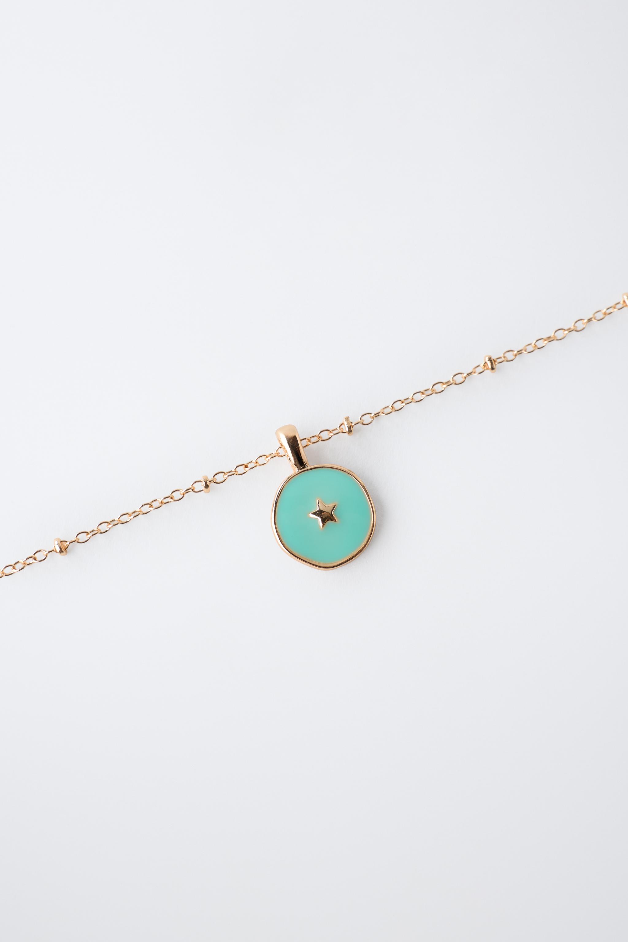 PACK OF TWO PLATE NECKLACES — Golden