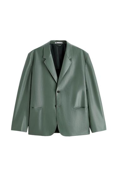 Green faux leather jacket with classic lapels and two front pockets. Visible label inside the collar.