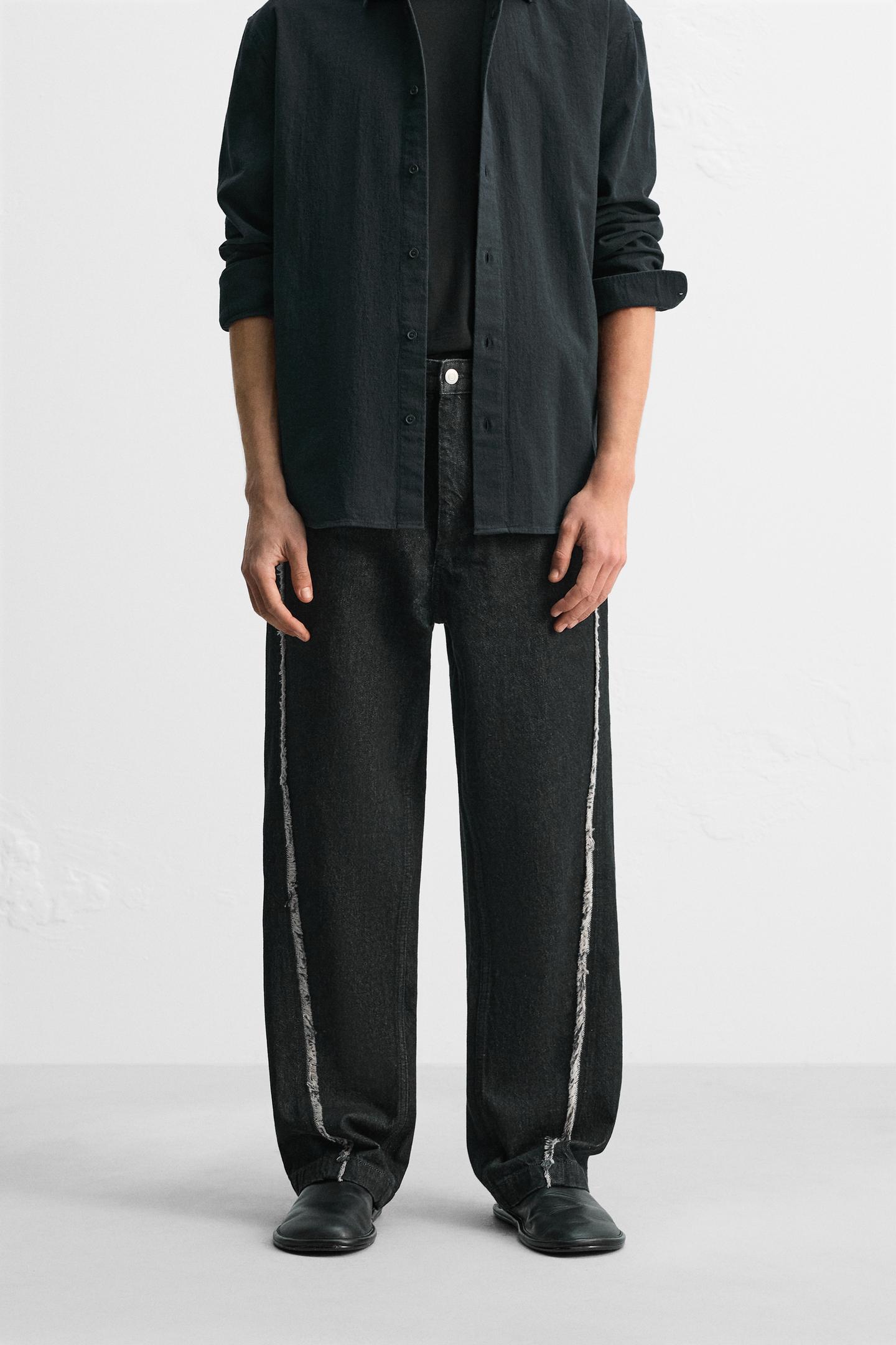 RELAXED STRAIGHT-LEG JEANS WITH FRAYED SEAMS