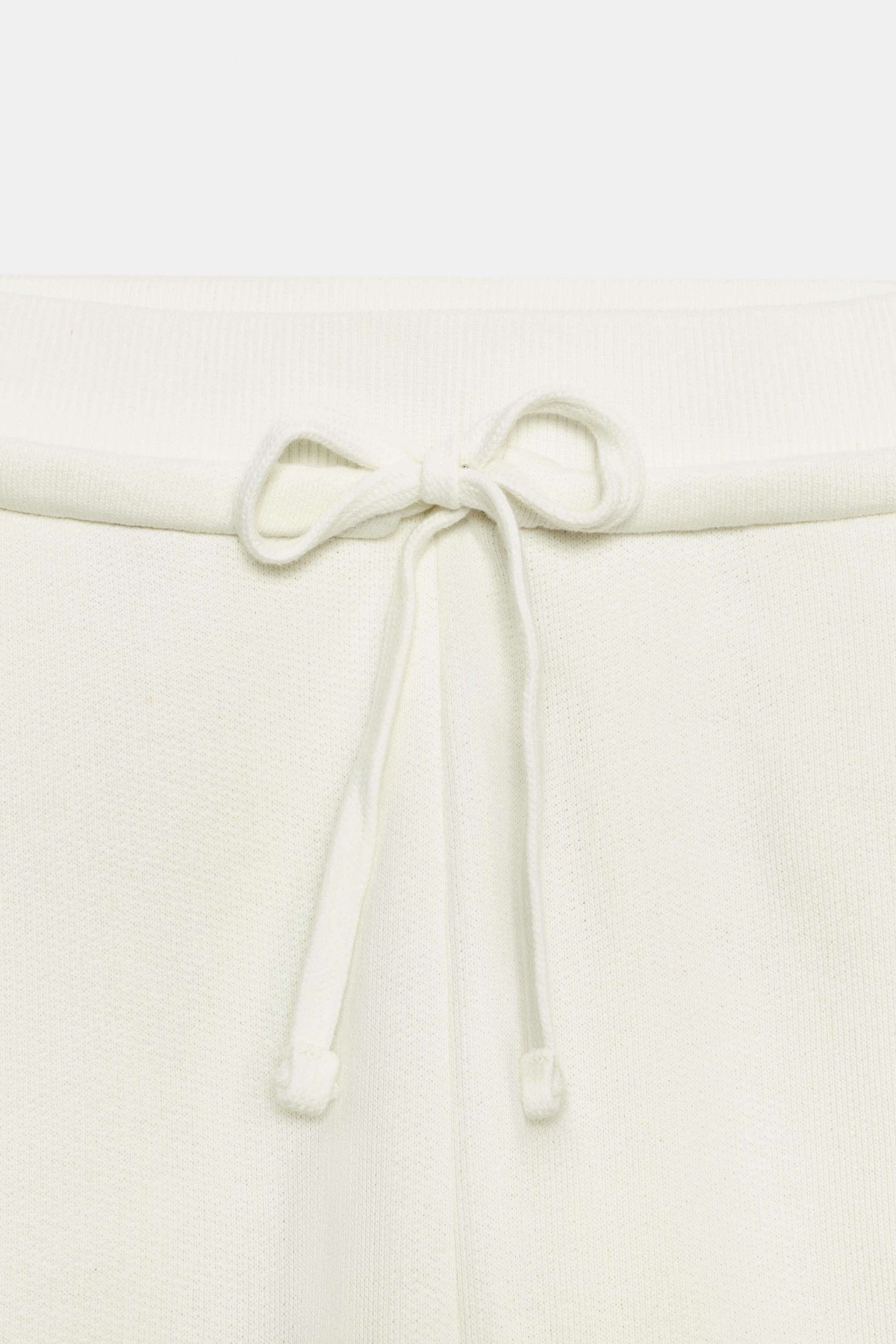 PANTALON EN MOLLETON À CORDONS
