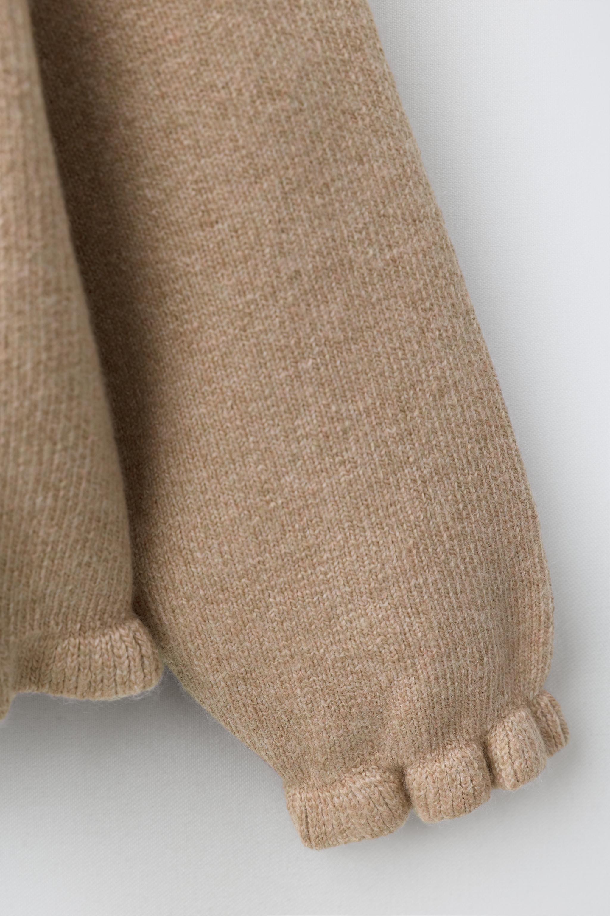GILET EN MAILLE À VOLANTS
