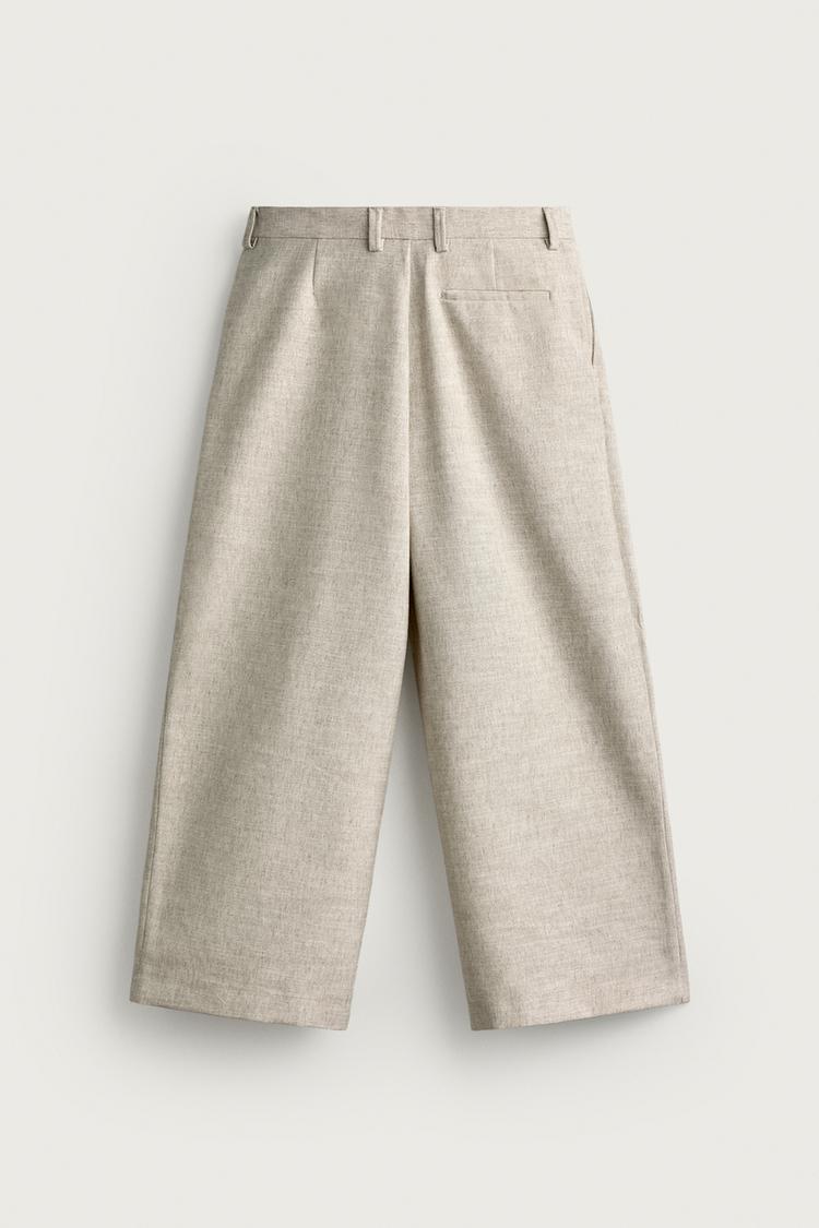 PANTALÓN CON PLIEGUES RELAXED FIT TEXTURIZADO 7